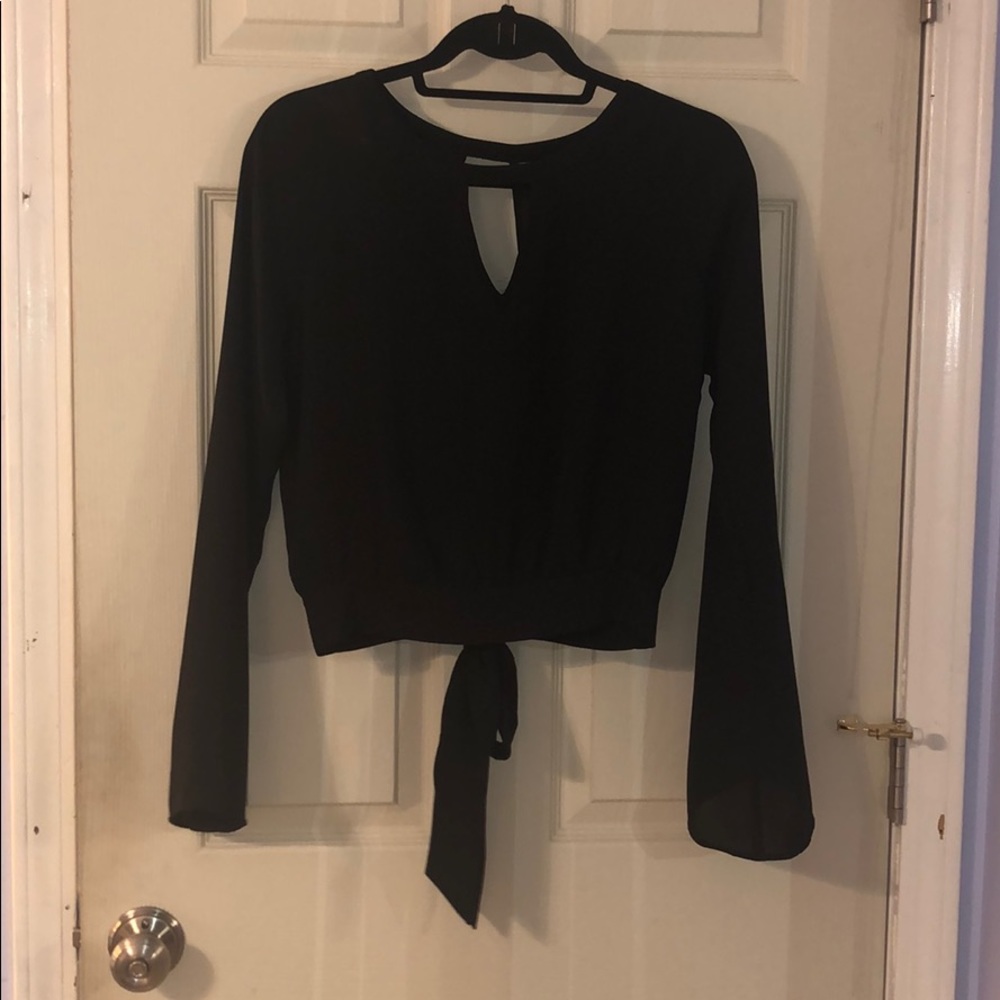 Bell Sleeve, open back, tie waist, crop top.